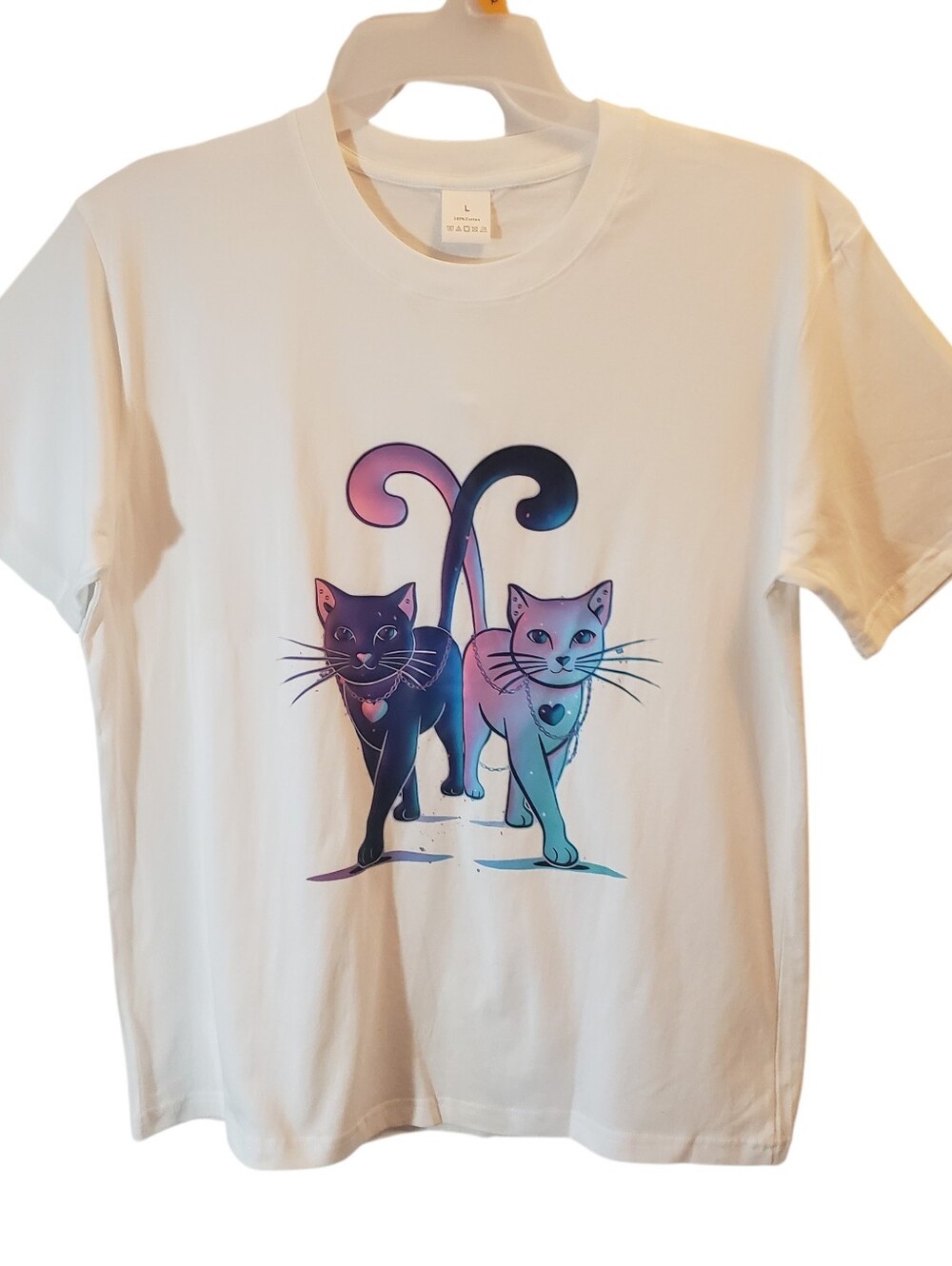 Womens lg shirt features a stylized vibrant art print depicting two cats walkin.